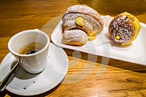 Italian Espresso coffee and dulce croissants