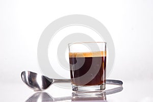 An italian espresso in a little glass