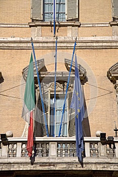 Italian and European Flag hanging from antique building in Rome, Italy, Europe