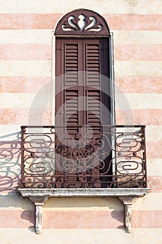 Italian facade with balcony