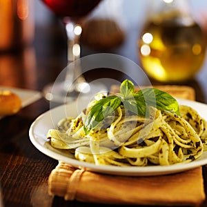 Italian fettuccine in basil pesto dinner