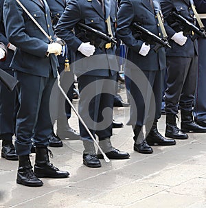 Italian financial police officers called Guardia di Finanza with photo