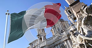 The italian flag flapping over Piazza Navona