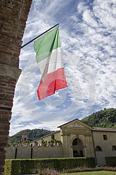 The Italian flag with sky in the background