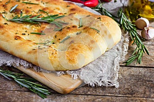 Italian focaccia bread with rosemary and garlic