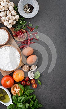 Italian food background, with tomatoes, basil, mushrooms, olives