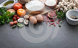 Italian food background, with tomatoes, basil, mushrooms, olives
