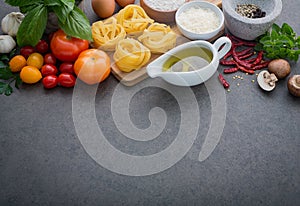 Italian food background, with tomatoes, basil, mushrooms, olives