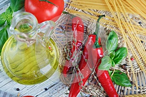 Italian food background, with tomatoes, basil, spaghetti, olive