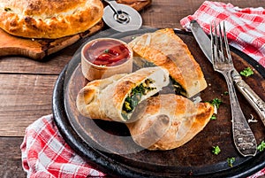 Calzone with Spinach and Cheese photo
