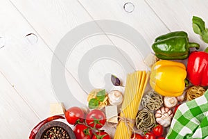 Italian food cooking ingredients. Pasta, tomatoes, peppes