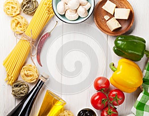 Italian food cooking ingredients. Pasta, tomatoes, peppes