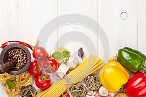 Italian food cooking ingredients. Pasta, tomatoes, peppes