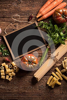 Italian food cooking ingredients. Pasta, vegetables.