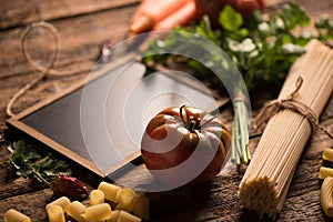 Italian food cooking ingredients. Pasta, vegetables.