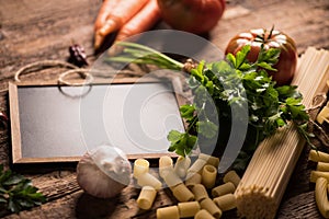 Italian food cooking ingredients. Pasta, vegetables.