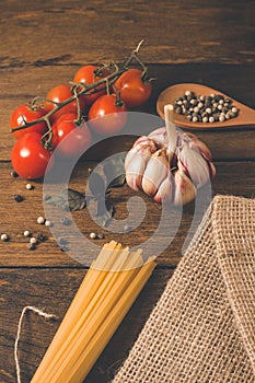 Italian food cooking ingredients. Pasta, vegetables, spices