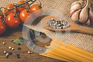 Italian food cooking ingredients. Pasta, vegetables, spices