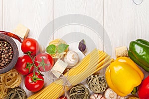 Italian food cooking ingredients. Pasta, vegetables, spices