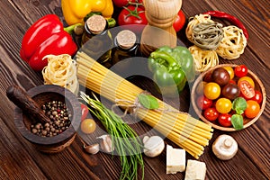 Italian food cooking ingredients. Pasta, vegetables, spices