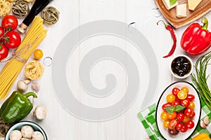 Italian food cooking ingredients. Pasta, vegetables, spices