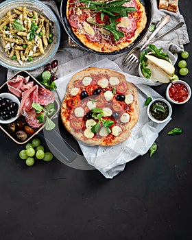 Italian food  on dark background