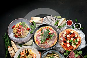 Italian food  on dark background