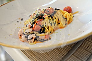 Italian food design - Stylish gourmet pasta with fish cuisine