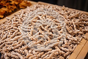 Italian food, dried handmade colorful pasta with walnuts, ready to cook, Milan, Lombardy, Italy photo