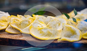 Italian food, fresh homemade stuffed pasta tortelli or ravioli dumplings ready to cook, Milan, Lombardy, Italy photo