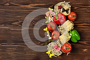 Italian Food Pasta Ingredients on Wooden Table Top View Pasta Background Variety of Pasta and Vegetables Flat Lay Copy Space