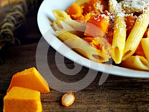 Italian food - Penne pasta with pumpkin photo