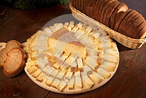 Italian food products Toma alpine cheese of Piedmont photo