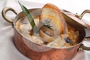Italian food recipes Ribollita, a traditional Tuscan soup with stale bread, kale, onions and beans