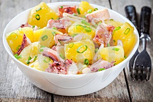 Italian food: salad with octopus, potatoes and onions