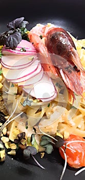 Italian food Tagliatelle with prawns red