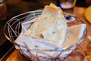 Italian fresh baked Piadina in basket. Served as appetizer