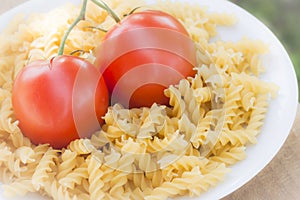 Italian fusilli pasta with tomatoes