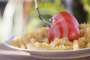 Italian fusilli pasta with tomatoes