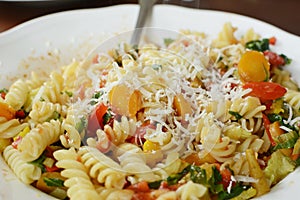Italian fusilli pasta with vegetable and parmesano photo
