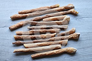 Italian grissini all`acqua or salted bread sticks on wooden background