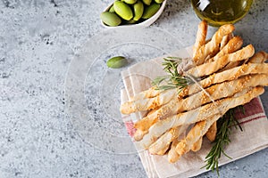 Italian grissini breadsticks with herbs and sesame seeds, copy space