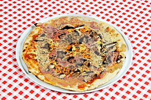 Italian ham and mushroom pizza.