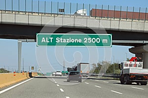 Italian Highway Sign\'ALT STAZIONE 2500m on  Roadway photo