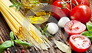 Italian Ingredients, Spaghetti,Olive Oil, Spices, Cherry Tomatoes and Mozzarella