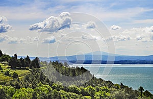 Italian landscape with lake and clouds