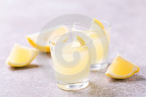 Italian lemon lime liqueur limoncello with ice and mint