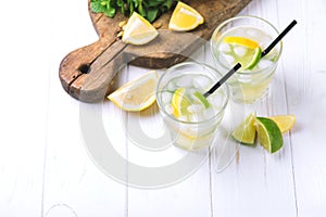 Italian lemon lime liqueur limoncello with ice and mint