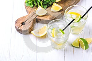 Italian lemon lime liqueur limoncello with ice and mint