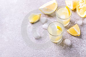 Italian lemon lime liqueur limoncello with ice and mint